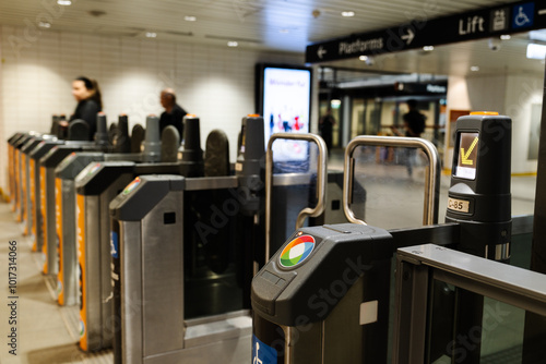 subway station, Town Hall Station in Sydney, New South Wales, Australia. The gates are part of the city's public transport system
