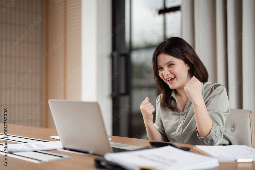 Happy Business Woman Celebrates Success at Work with Excitement and Joy in Modern Office Environment Happy Business Woman Celebrates Success at Work with Excitement and Joy in Modern Office Environment
