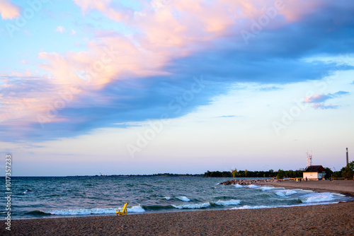 Photography dramatic cloud over expansive beach with waves room for text shot on kew beach i