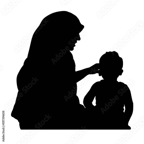silhouette of a muslim mother with her son