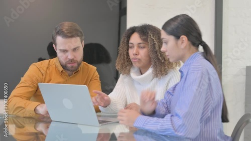 Business People Reacting to Loss in Office