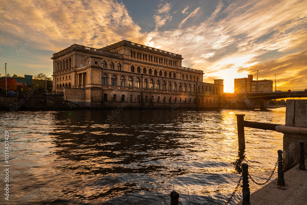 Building of Koenigsberg stock exchange on Pregola river at sunset. Kaliningrad. Russia