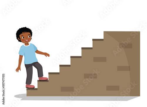 Cute little African boy going upstairs
