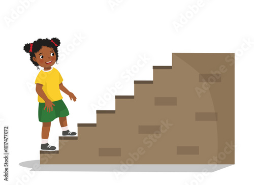 Cute little African girl going upstairs
