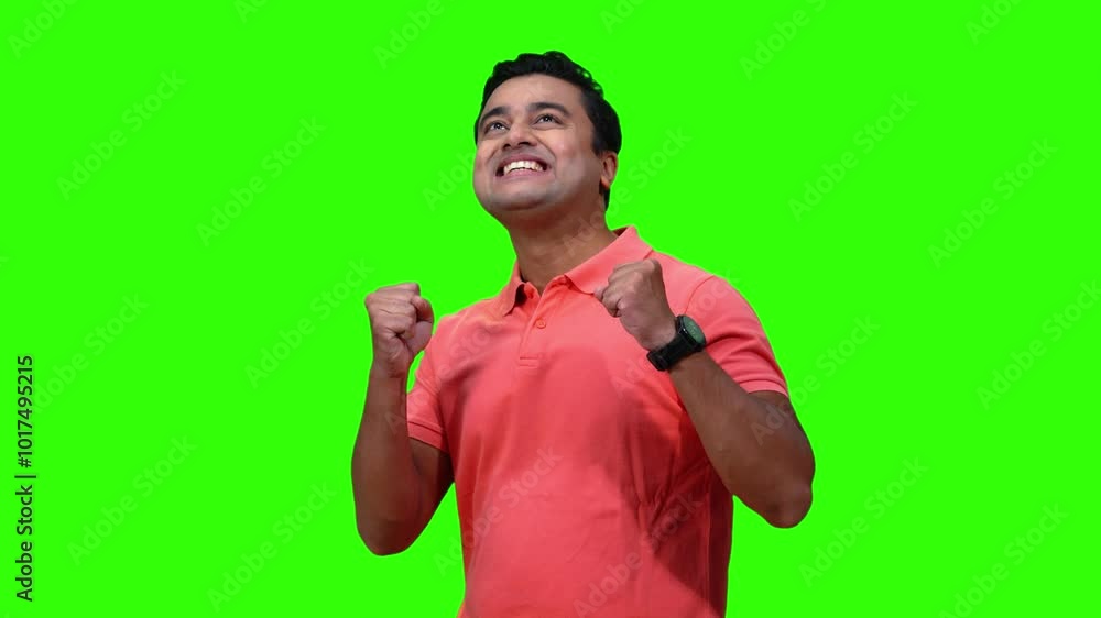 Green screen face of a young smart man. Winning and victory gestures. Overjoyed and successful. Looking up and thanking God. Presentation video. Green screen face of a young smart man. Winning and victory gestures. Overjoyed and successful. Looking up and thanking God. Presentation video.