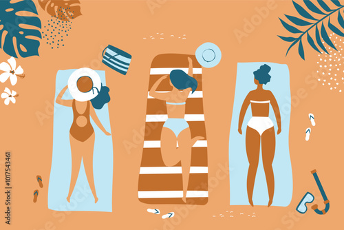 Group of beautiful tanned girls in swimsuit sunbathing on the beach on sea or ocean. Women lying on towels on sandy shore. Top view. summer time, relax, rest and vacation.