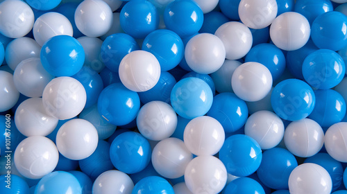 White and blue plastic balls selected for a ball pit