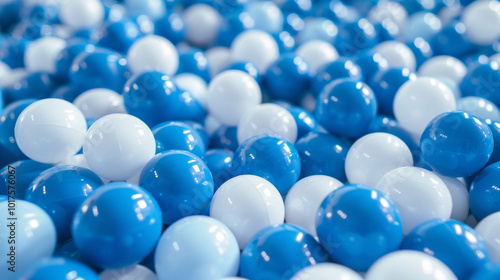 White and blue plastic balls selected for a ball pit