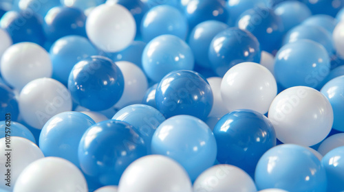 White and blue plastic balls selected for a ball pit