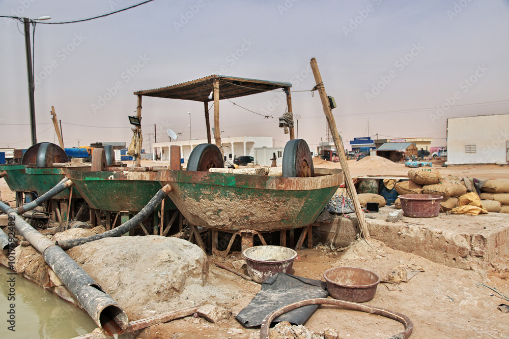Nouakchott, Mauritania - 06 Jan 2022: Factory next to a gold mine in Sahara desert not far Nouakchott, Mauritania, West Africa