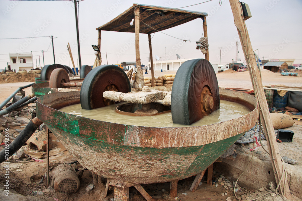 Nouakchott, Mauritania - 06 Jan 2022: Factory next to a gold mine in Sahara desert not far Nouakchott, Mauritania, West Africa