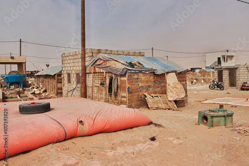 Obraz na płótnie Nouakchott, Mauritania - 06 Jan 2022: Factory next to a gold mine in Sahara desert not far Nouakchott, Mauritania, West Africa w salonie