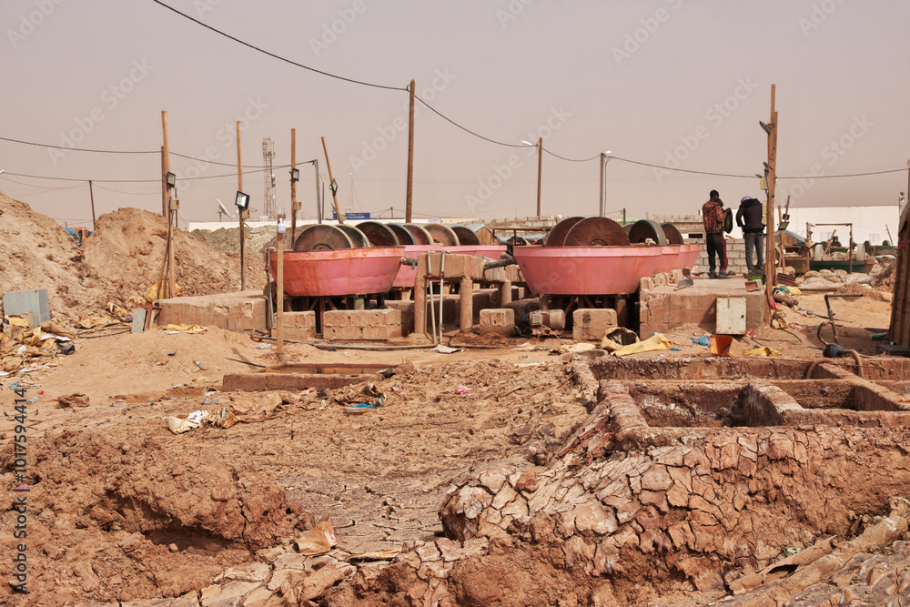 Nouakchott, Mauritania - 06 Jan 2022: Factory next to a gold mine in Sahara desert not far Nouakchott, Mauritania, West Africa