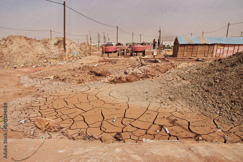 Nouakchott, Mauritania - 06 Jan 2022: Factory next to a gold mine in Sahara desert not far Nouakchott, Mauritania, West Africa