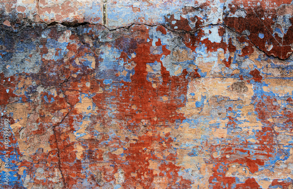 Old grunge wall with blue and red paint. Abstract background for design. Old grunge wall with blue and red paint. Abstract background for design.