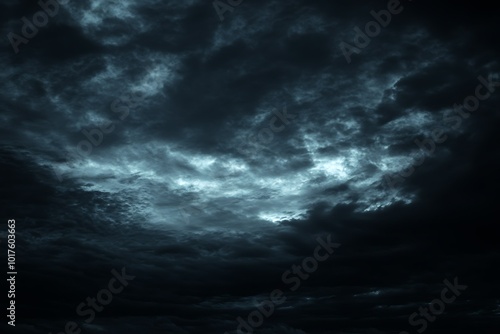 Dark, moody clouds create an atmospheric sky scene.