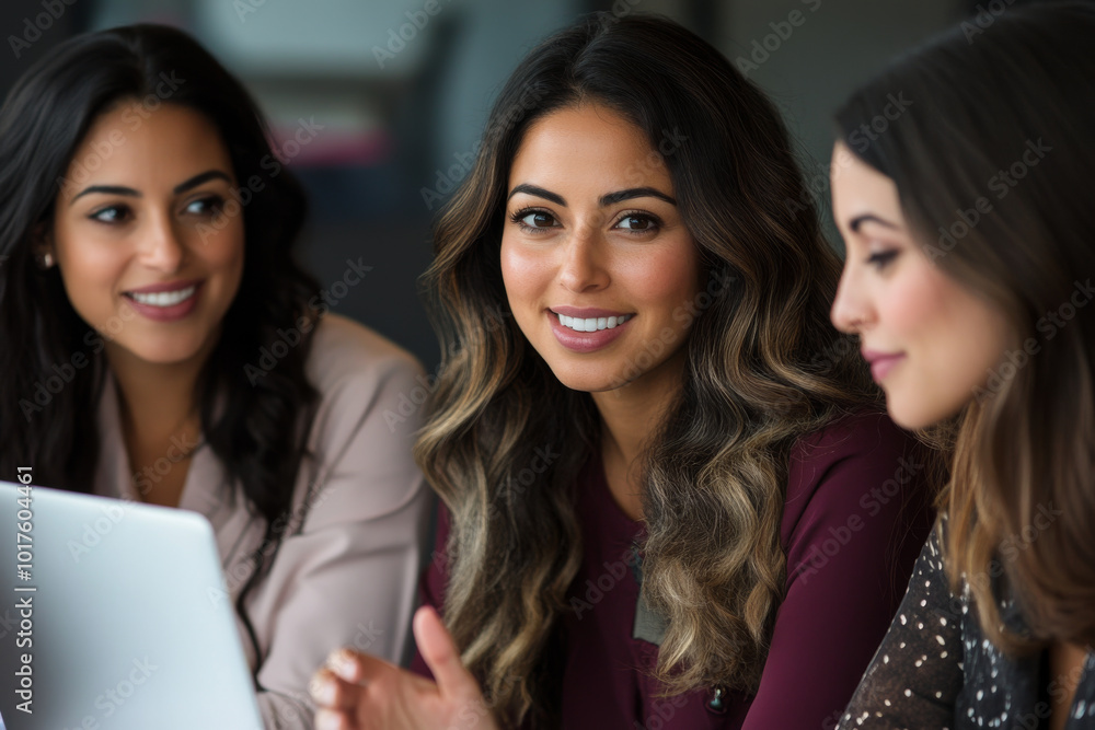 A diverse group of female consultants collaborating on a business project, discussing strategic solutions in a modern office. A diverse group of female consultants collaborating on a business project, discussing strategic solutions in a modern office.