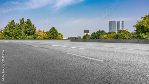 Serene Urban Landscape with Clear Skies and Lush Greenery