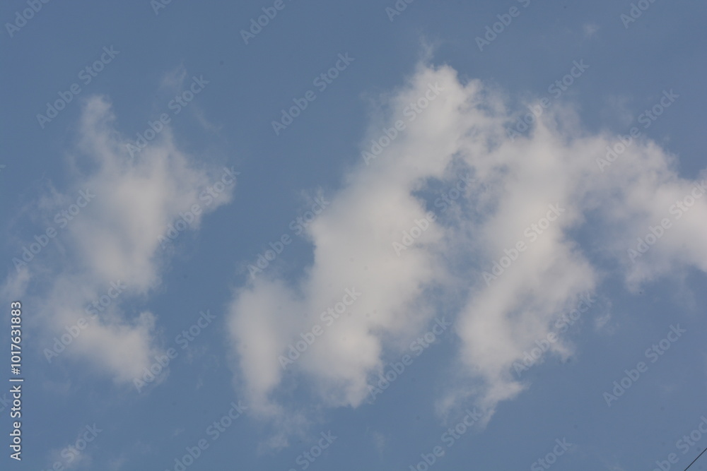 Dramatic white clouds with blue sky on sunny day Dramatic white clouds with blue sky on sunny day