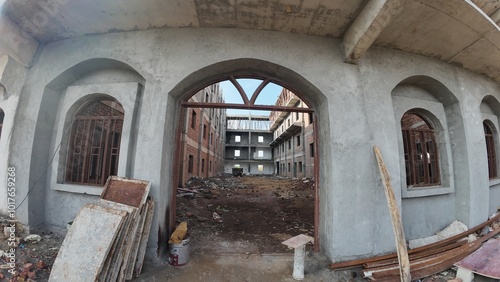 Urban exploration in an abandoned construction site with remnants of old bricks and debris