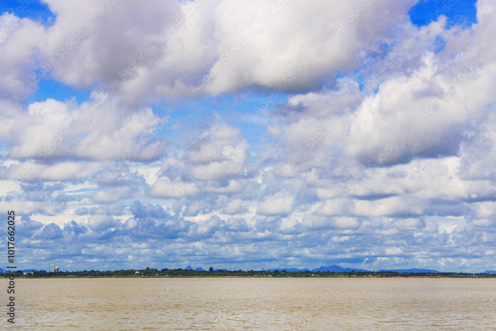 Obraz premium River landscape and blue sky.