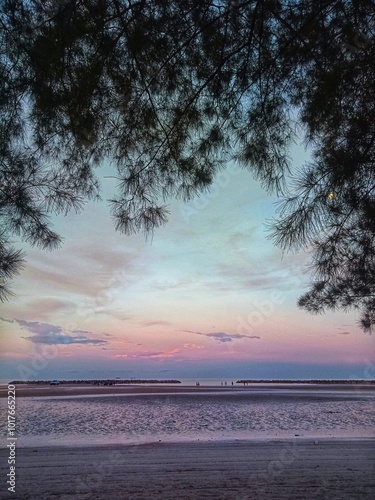 beautiful sunset on pasir padi beach bangka photo