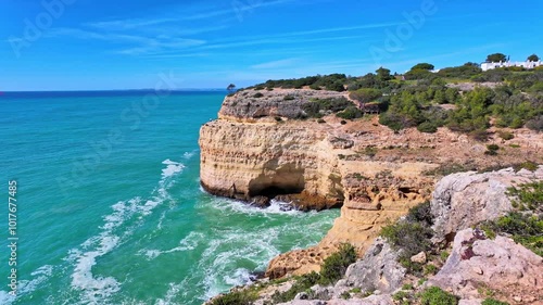 Portuguese coast in Benagil, Algarve, Portugal. Farol de Alfanzina. Alfanzina Lighthouse. Percurso dos Sete Vales Suspensos. Seven Hangging Valleys Trail. photo