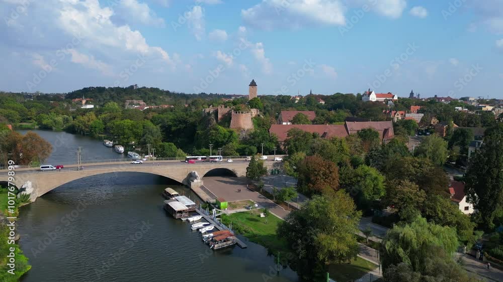 Drone view of Giebichenstein fortress and the cityscape of halle - saale - in saxony anhalt, germany, on a sunny summer day. Unique aerial view flight panorama orbit drone Drone view of Giebichenstein fortress and the cityscape of halle - saale - in saxony anhalt, germany, on a sunny summer day. Unique aerial view flight panorama orbit drone