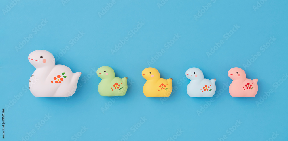 : Japanese new year material. Zodiac Snake. Snake ornament on the light blue background. 日本のお正月素材。干支の巳(ヘビ)。水色背景上の巳の置物 : Japanese new year material. Zodiac Snake. Snake ornament on the light blue background. 日本のお正月素材。干支の巳(ヘビ)。水色背景上の巳の置物
