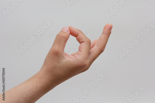 Child Jnana Mudra gesture on white background photo