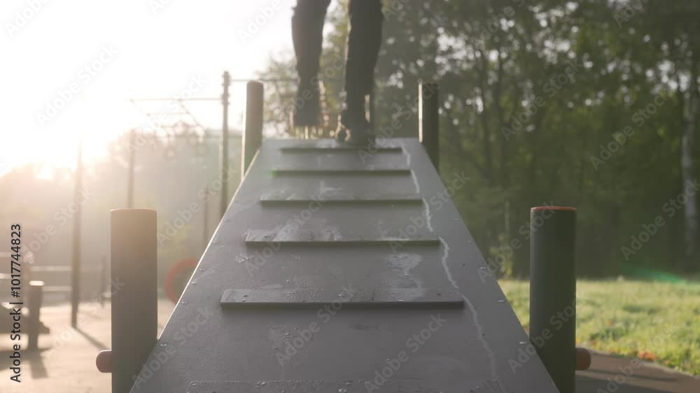Muscular Young Man with Naked Torso Running Outdoors in the Morning Muscular Young Man with Naked Torso Running Outdoors in the Morning
