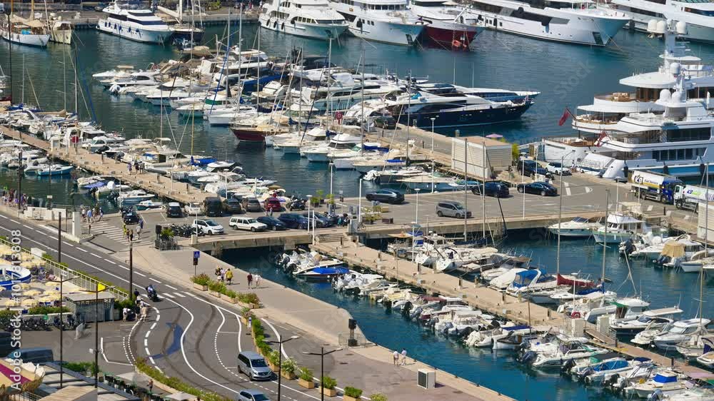 View of white boats docked in the in the Monaco Marina View of white boats docked in the in the Monaco Marina