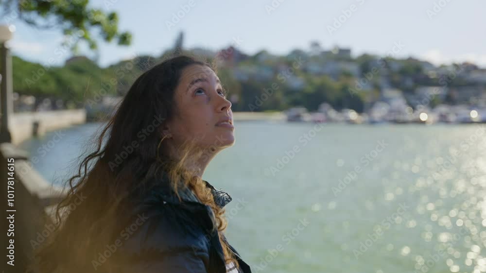 Young woman enjoying the view of the bay in Sydney Australia on sunny day. Female tourist or local relaxing outside looking at Rose Bay. Smiling traveling leaning on balcony close to boat harbor Young woman enjoying the view of the bay in Sydney Australia on sunny day. Female tourist or local relaxing outside looking at Rose Bay. Smiling traveling leaning on balcony close to boat harbor