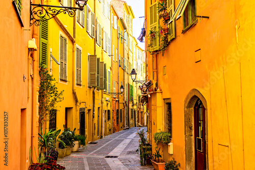 Fototapeta Naklejka Na Ścianę i Meble -  Colorful streets of the historic center of the city of Menton on the French Riviera, Cote d'Azur, France
