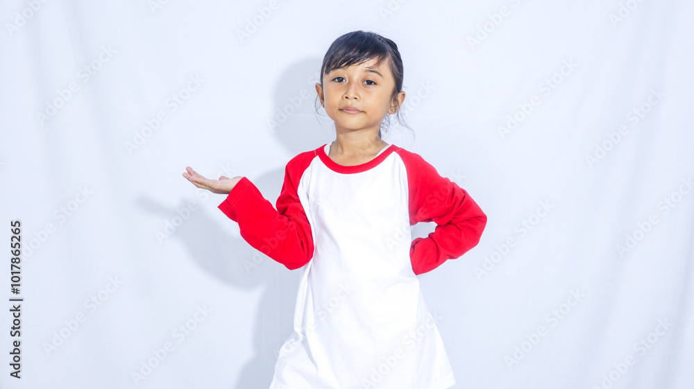 Asian Indonesian kid child little girl pose open hand and presenting isolated on white background Asian Indonesian kid child little girl pose open hand and presenting isolated on white background