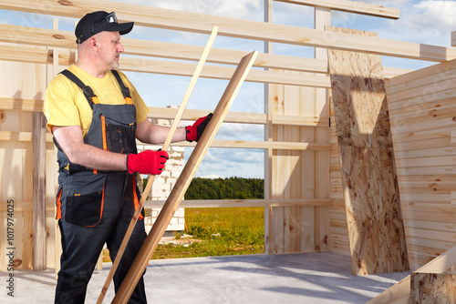 Boards in hands of builder....