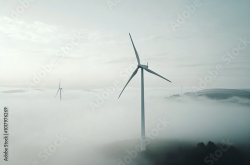 Wallpaper Mural Wind turbines stand tall among clouds at dawn in a serene landscape with rolling hills Torontodigital.ca
