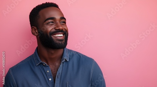 Portrait of a happy handsome man in a shirt with laughing