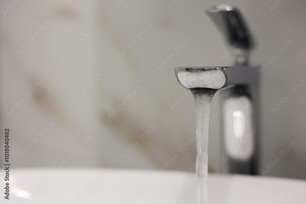 Modern Chrome Faucet With Flowing Water In Bathroom Modern Chrome Faucet With Flowing Water In Bathroom