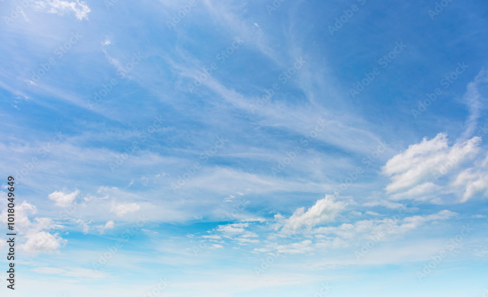 Fototapeta premium Bright Blue Sky with White Cloud background: A Clear Summer Day with Light Gradients winter cloudy and Nature Beauty texture, Horizon air in summer day. abstract Landscape spring View