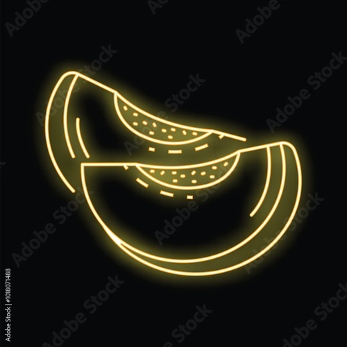 Neon sign showing two appetizing slices of cantaloupe melon on black background