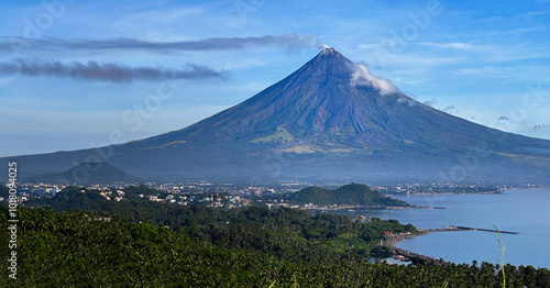 Mayon Volcano with a beautiful landscape of forest and legazpi city boulevard albay philippines photo