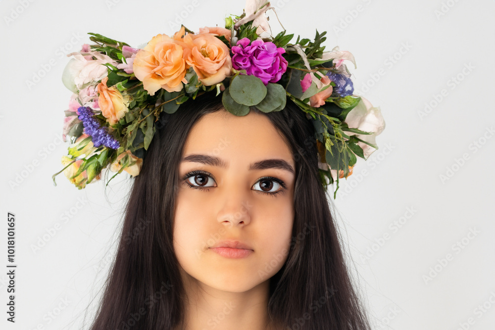 Girl in gray with wreath the . beautiful portrait w concept. girl with a wreath on her head on white . a girl in white with a wreath on her head and flowers lifestyle on a gray. Girl in gray with wreath the . beautiful portrait w concept. girl with a wreath on her head on white . a girl in white with a wreath on her head and flowers lifestyle on a gray.