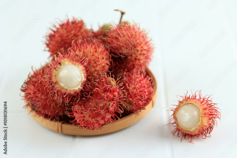 Close Up Rambutan on Bamboo Plate Close Up Rambutan on Bamboo Plate