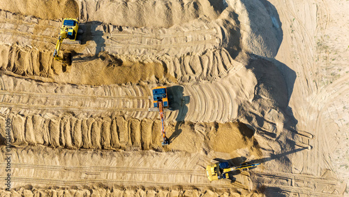 Construction equipment on a construction site view from a quadcopter photo