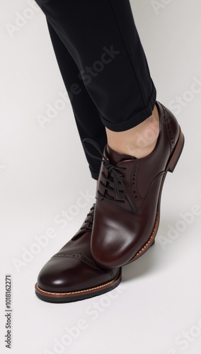 A close-up shot of a woman wearing high heels with visible toes and foot details photo