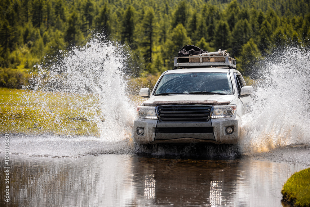 Japanese SUV crossing a river in the north of Mongolia Japanese SUV crossing a river in the north of Mongolia