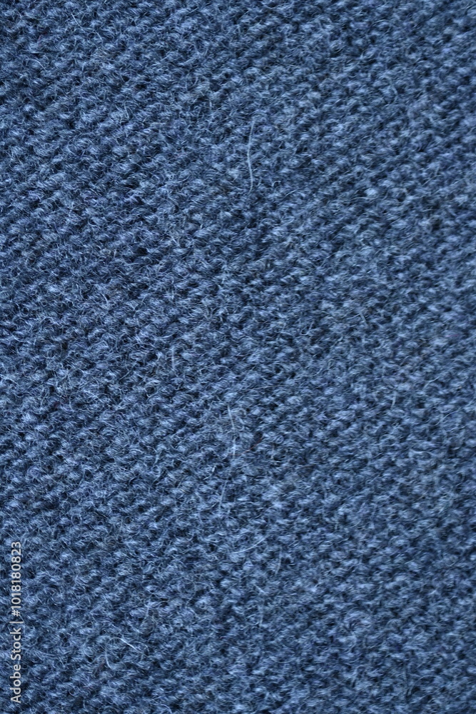 Macro texture of gray wool crochet sweater as background, close-up of purple crochet front surface, texture of woolen wool, crochet front surface Macro texture of gray wool crochet sweater as background, close-up of purple crochet front surface, texture of woolen wool, crochet front surface
