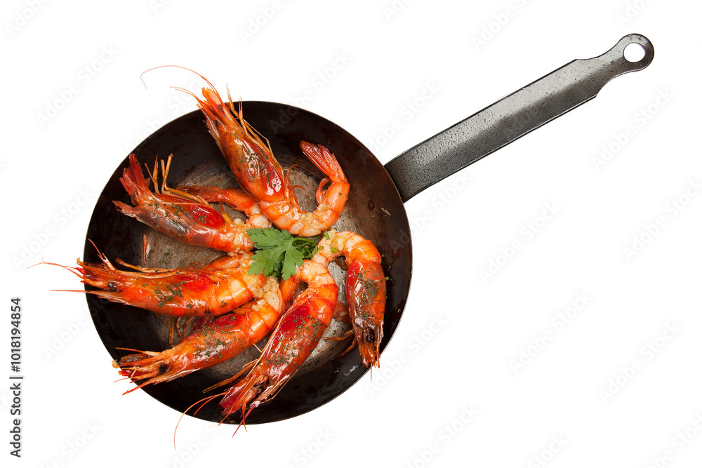 Overhead shot of black frying pan with red shrimp on white background Overhead shot of black frying pan with red shrimp on white background