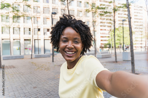 Portrait, selfie smile and happy black woman taking pictures to remember memory, social media or profile picture. Face, beauty and female from South Africa talking photo outdoors